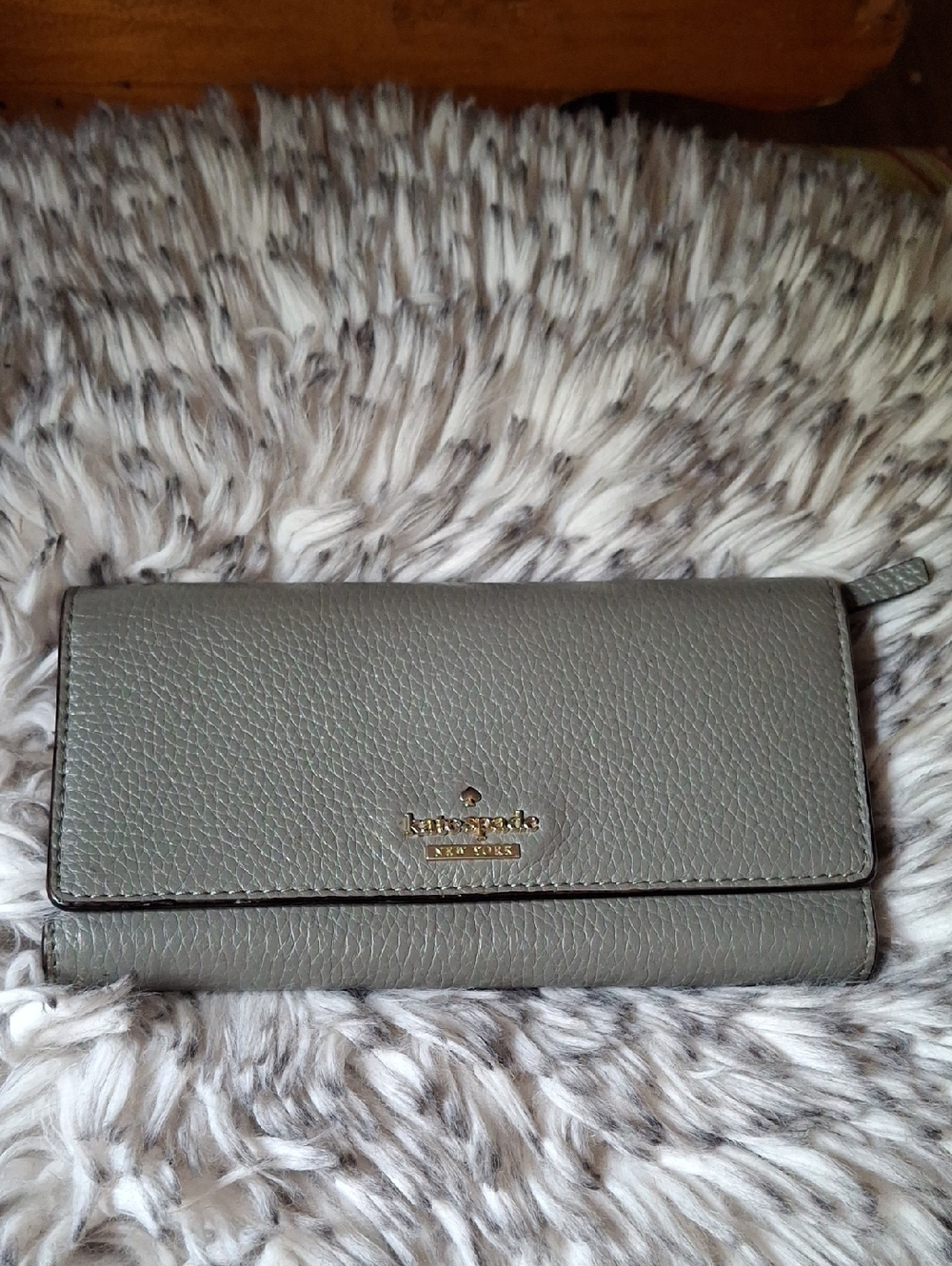kate spade gray pebbled leather continental wallet with gold logo